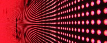 red dot lights on black surface